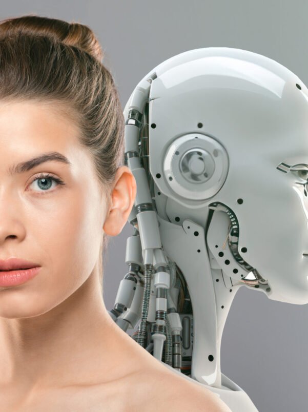 Innovations of beauty industry. Close up portrait of young gorgeous lady with perfect face and skin posing to camera with artificial robot, grey studio background, free space