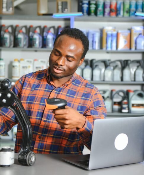 Smiling Salesman Auto Parts Store.